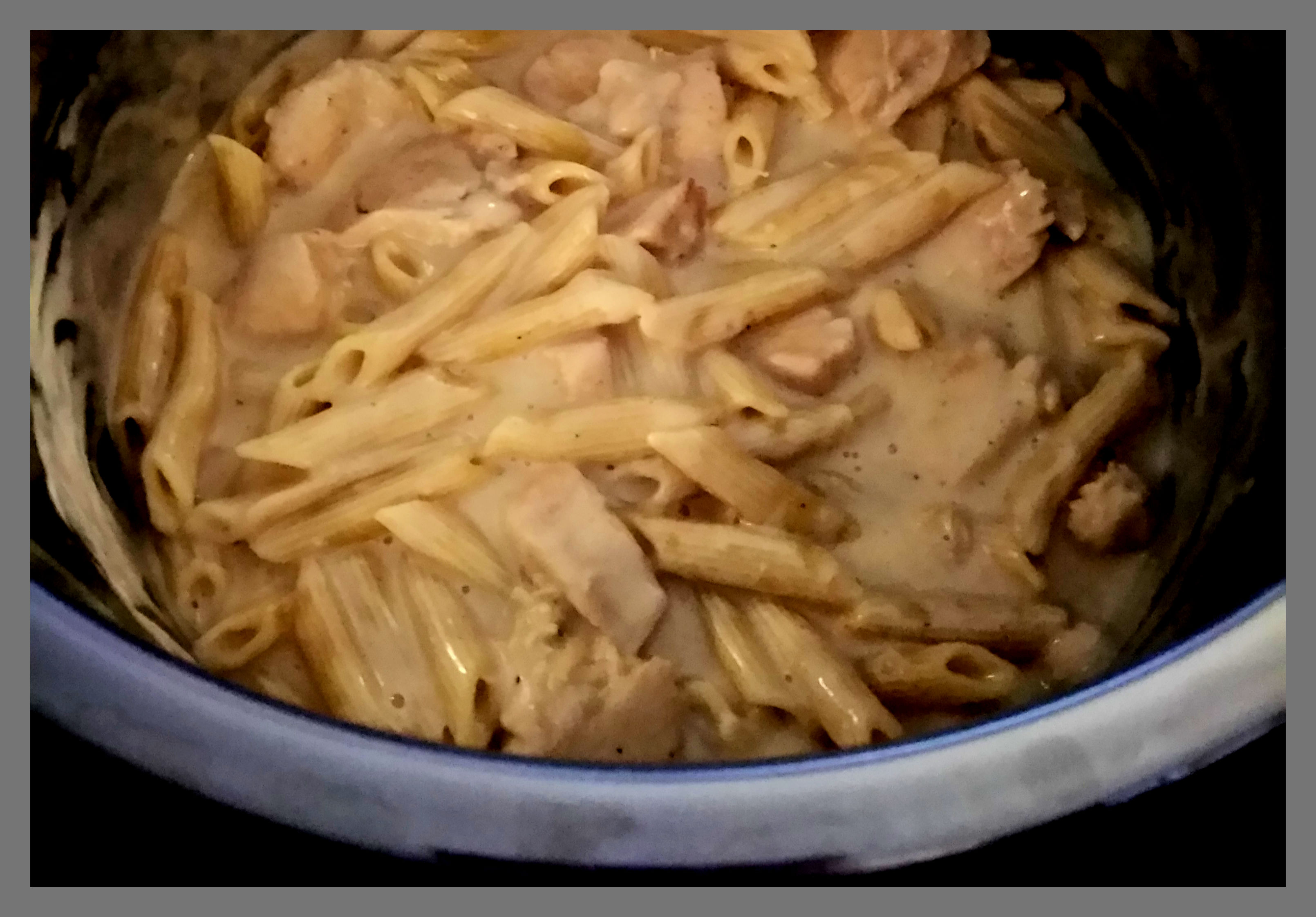 Instant Pot filled with Chicken Alfredo.