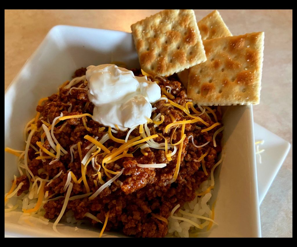 A white bowl filled with Instant Pot No Bean chili.