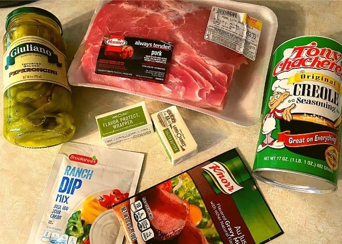 All the ingredients need to make Instant Pot Mississippi Pork Roast on a kitchen counter.