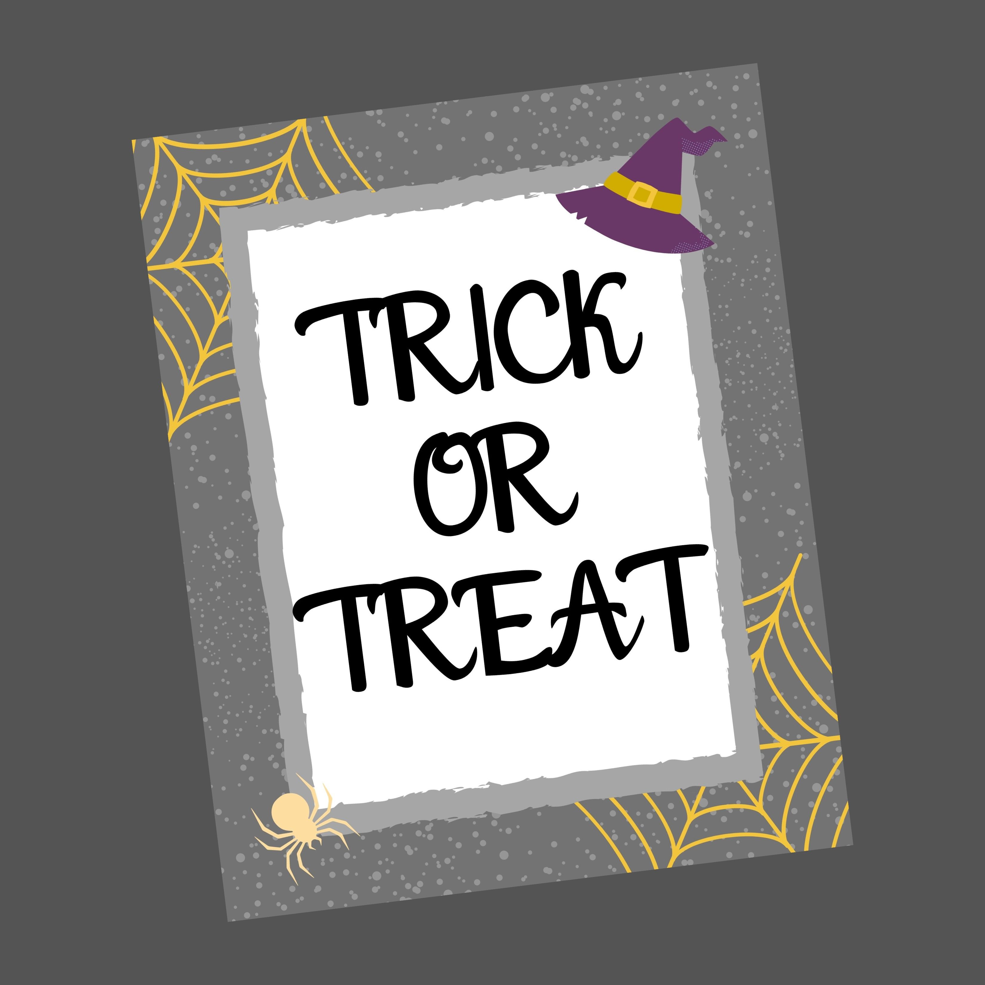 Grey trick or treat printable with a yellow spider and spider web.