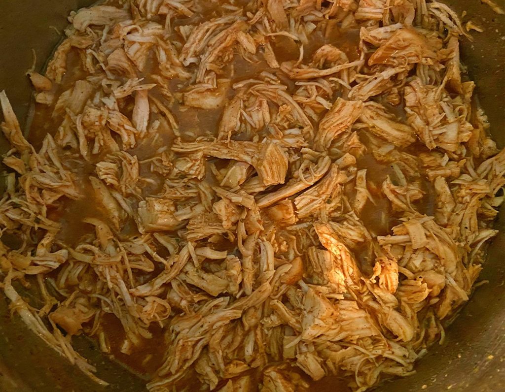 Shredded chicken inside of an Instant Pot