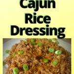 A white plate filled with cajun rice dressing topped with sliced green onions.