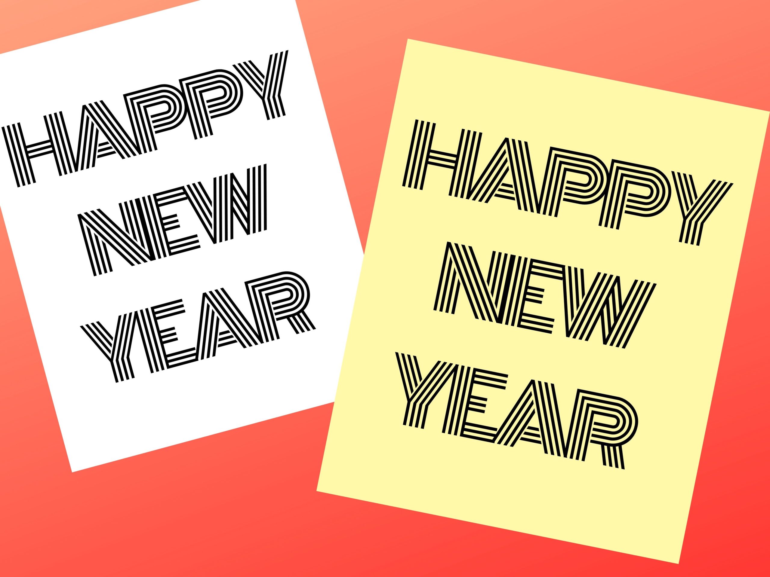 Two 8" x 10" decorations (one with a white background and one with a yellow background) with black lettering saying "Happy New Year".
