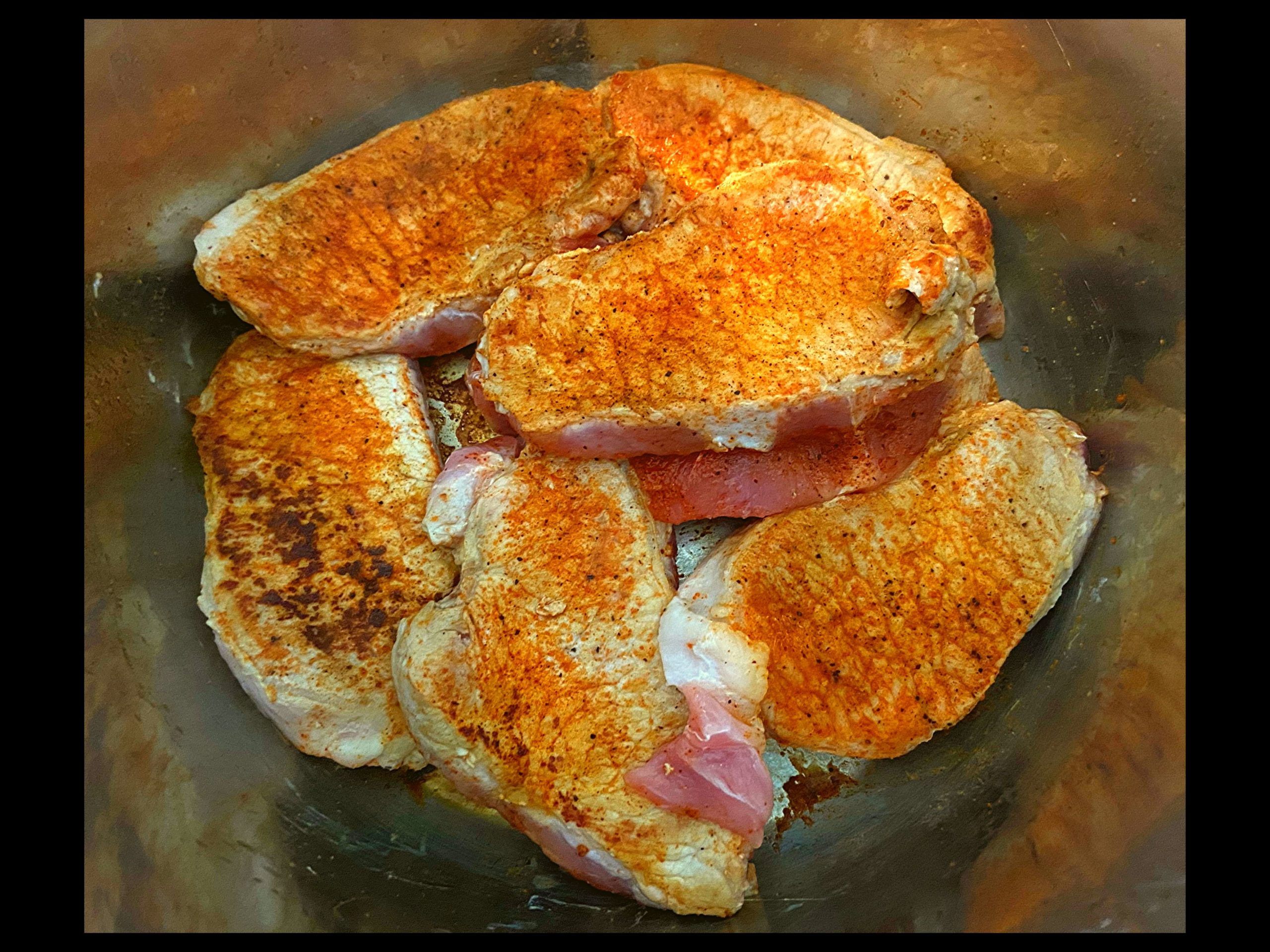 Browned pork chops in an Instant Pot