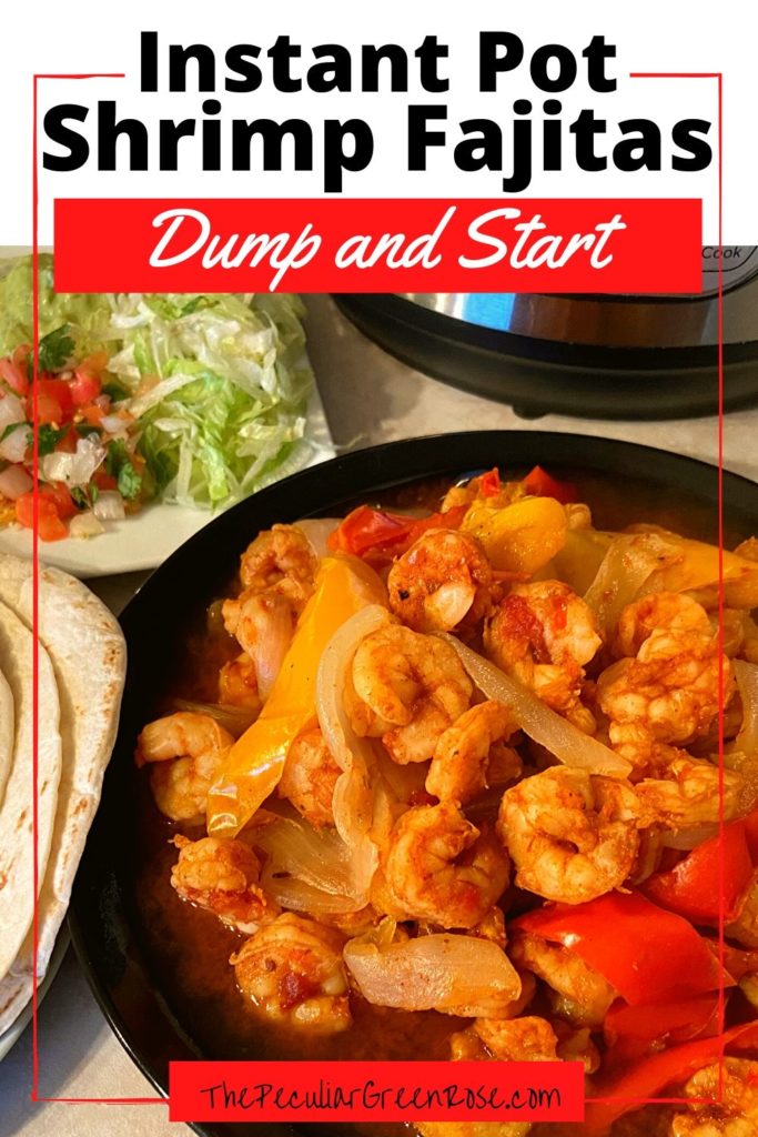A black plate filled with cooked shrimp, onions, and bell peppers in a fajita sauce.