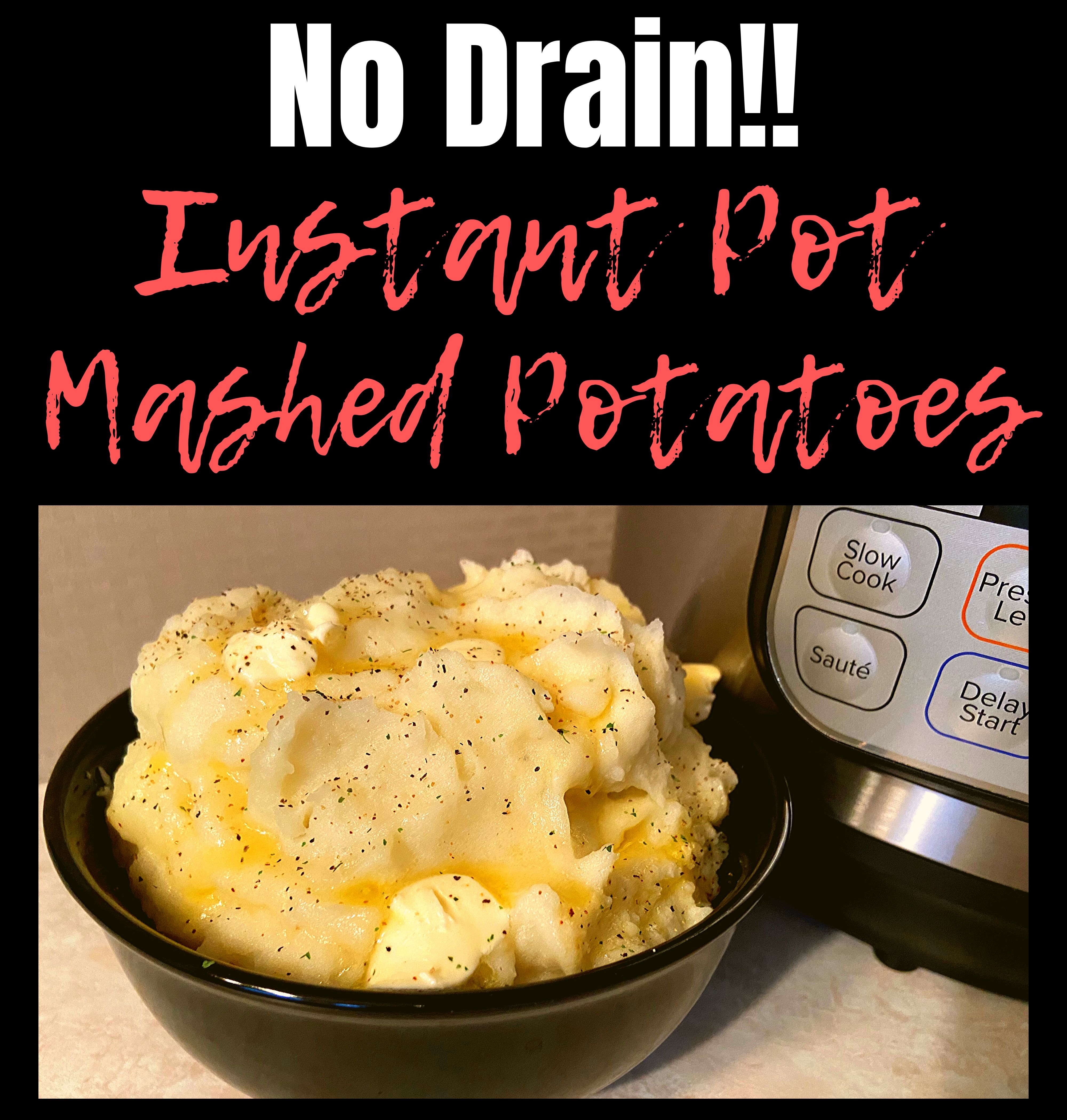 A black bowl filled with fluffy mashed potatoes with butter sitting on a kitchen counter in front of an Instant Pot.