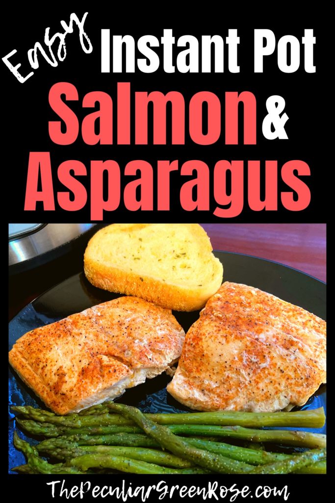 A black plate with seasoned salmon fillets and asparagus sitting in front of an Instant Pot.