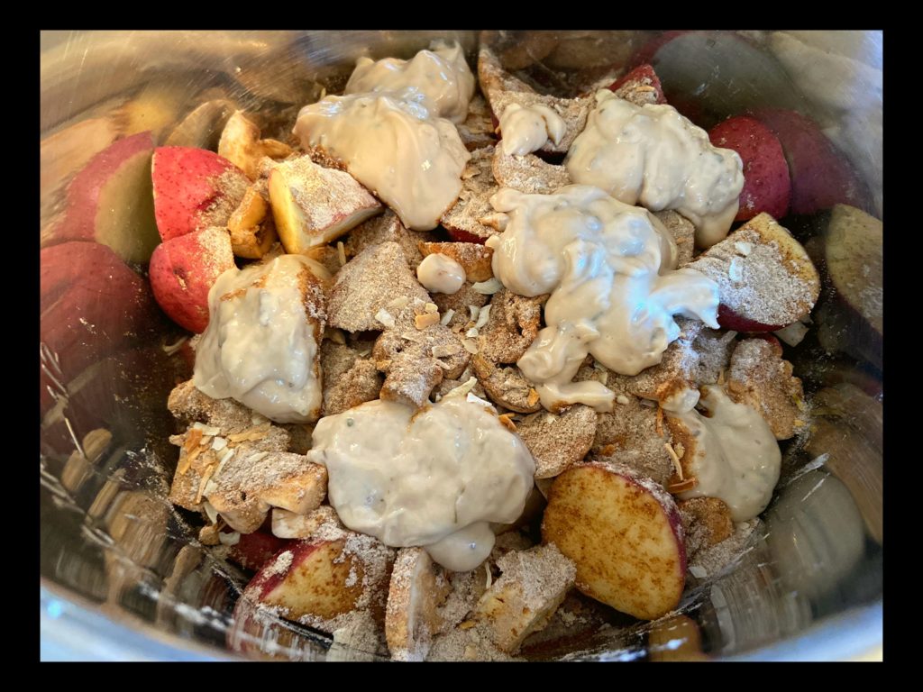 The inside of an Instant Pot with Beef Tips & Gravy Ingredients ready to be pressure cooked.