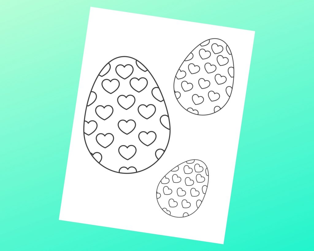 A black and white easter egg coloring page with three eggs filled with hearts.