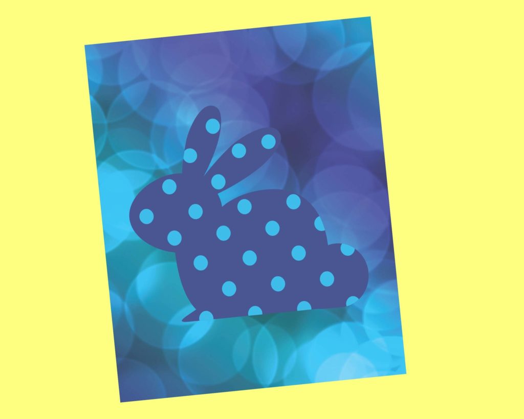 Blue Polka Dot Bunny Silhouette on blue and purple background.