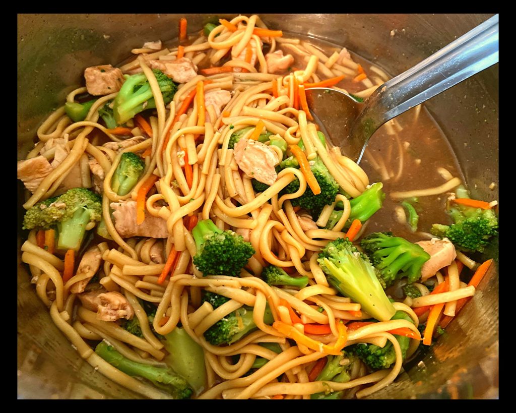 A Instant Pot filled with Chicken Lo Mein.