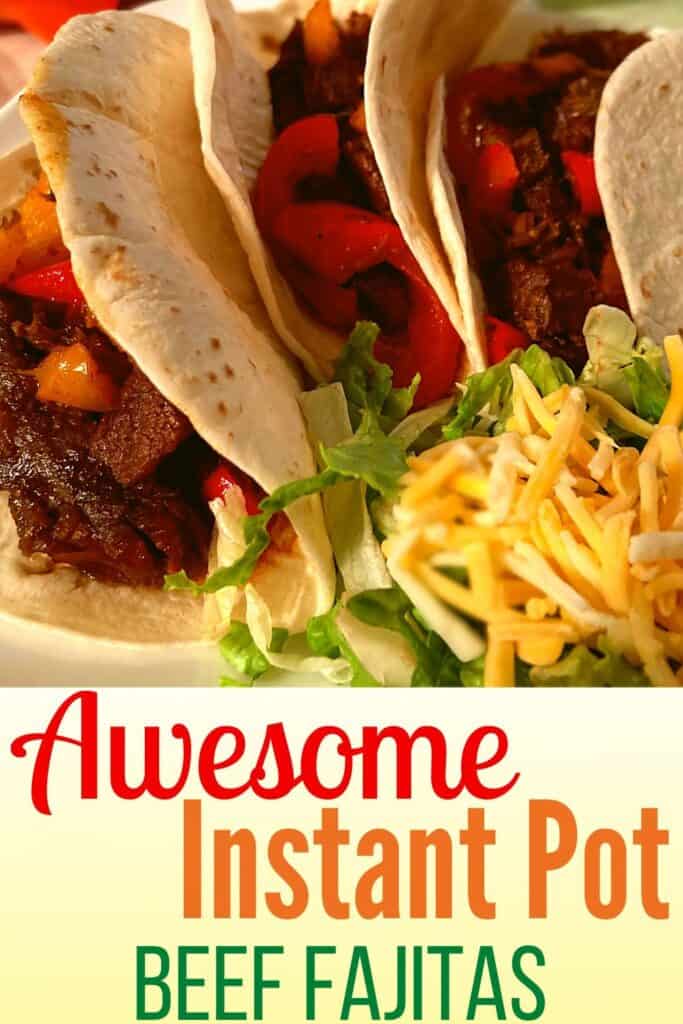 Instant Pot Steak Fajitas on a white plate next to shredded lettuce and cheese.