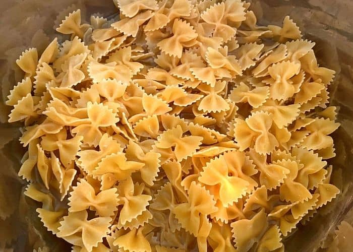 Uncooked bow tie pasta in a Instant Pot