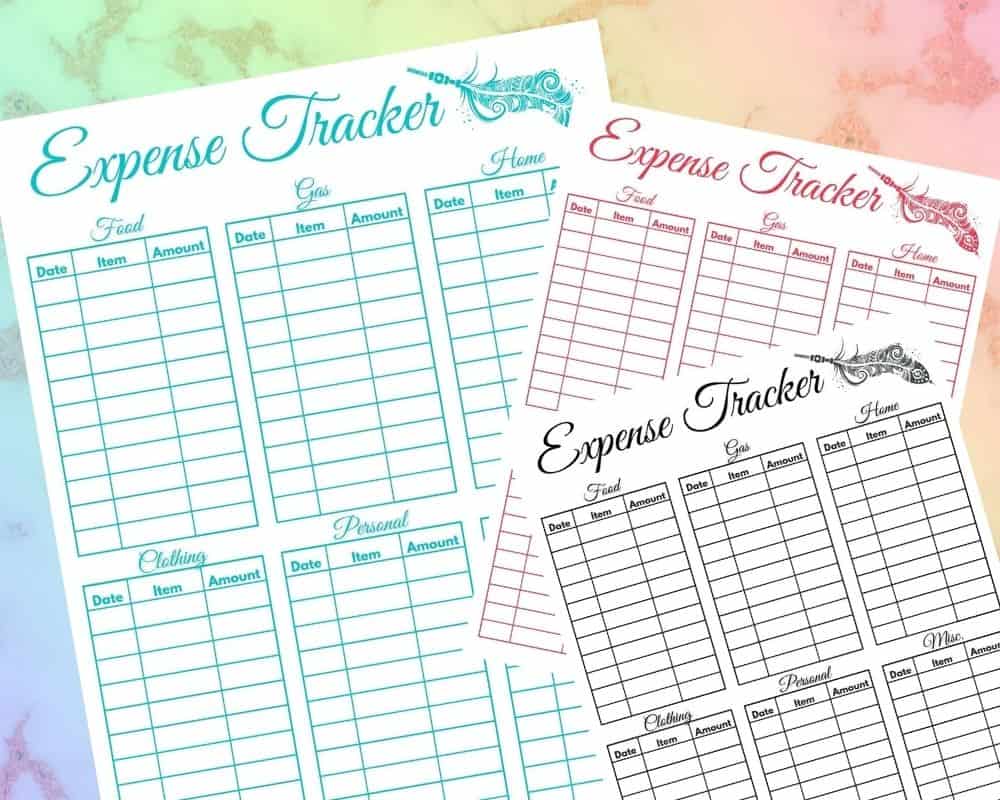 A blue, red, and black Expense Tracking Sheet Printable on a marble counter top.
