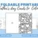 20 printed out fathers day cards on a desktop